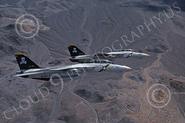 F-14USN 00870 Two flying Grumman F-14 Tomcats USN VF-84 JOLLY ROGERS USS Theodore Roosevelt 4-1990, by Robert L Lawson -L.jpg