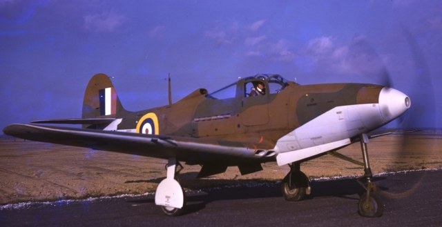 Bell 14 Airacobra I RAF sn AH621 with engine running Bell test pilot Robert M. Bob Stanley is at the controls Buffalo New York ca. 1941..jpg