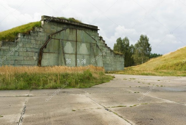 depositphotos_81419058-stock-photo-abandoned-soviet-military-hangar.jpg