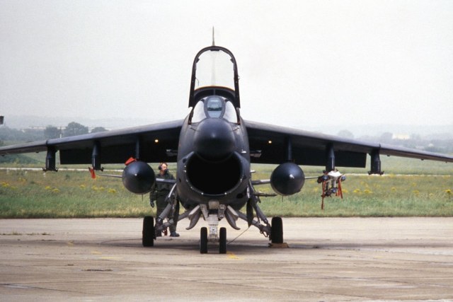 A-7D Corsair II aircraft on the flight line as a member of the 127th Tactical Fighter Wing Michigan Air National Guard performs a pre-flight check during Exercise CORONET PACKER.jpg
