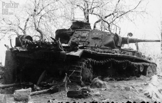 Knocked-out Panzer III (5 cm) Ausf. F outfitted with many on-field modifications, probably circa 1941..jpg