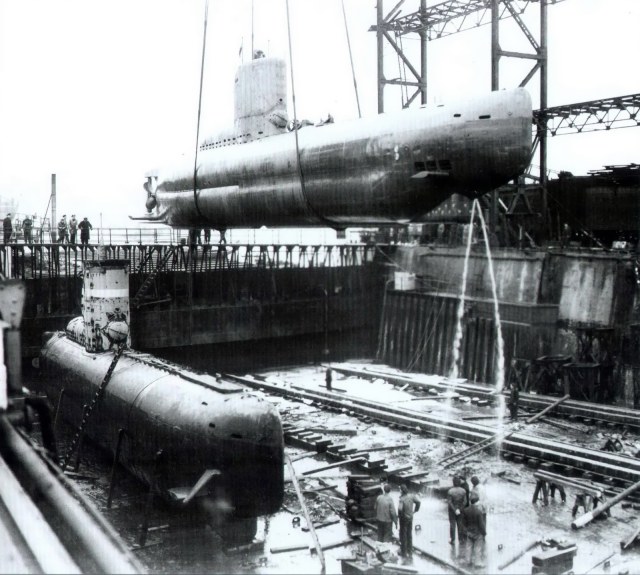 20 u-boat german submarine world war ii dock shipyard crane maintenance ground naval crew.jpg