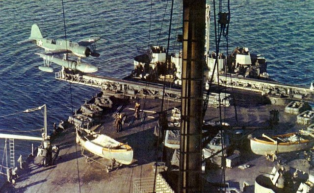 OS2U Kingfisher floatplane preparing to be launched aboard USS Alabama, circa Jan 1943.jpg