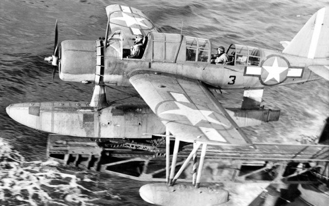 A Kingfisher scout plane catapults off the cruiser USS Detroit.jpg