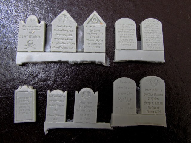 Могильные надгробия и памятники